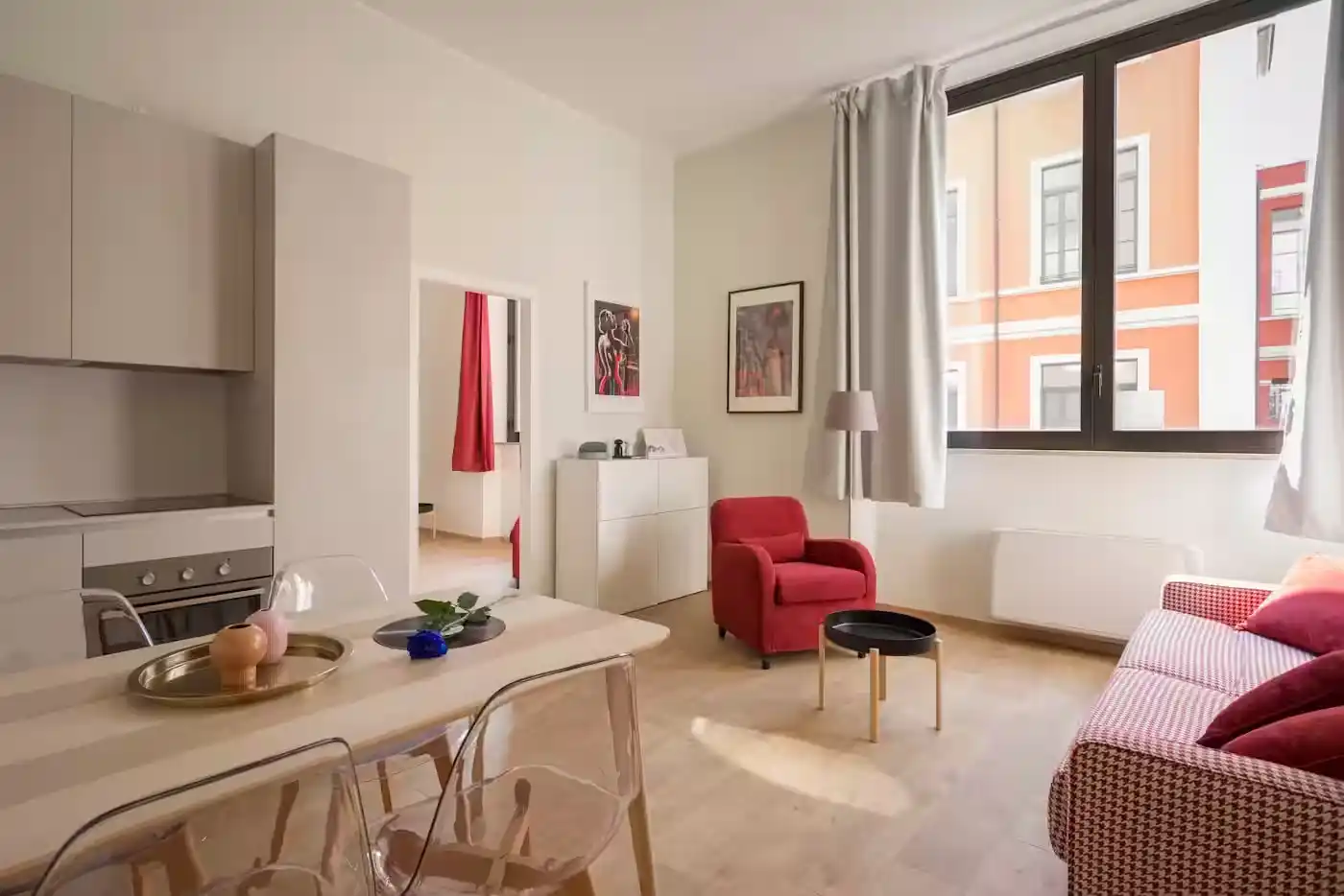 Modern apartment interior with kitchen, sofa, and rental service, UK